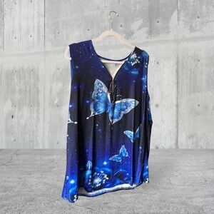Dark blue with large butterfly. Sleeveless summer zip front top.